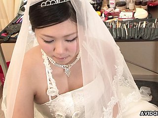 Brunette Emi Koizumi fucked exposed to bridal dress uncensored.